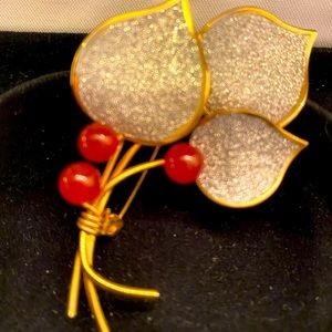 Vintage brooch with natural stones
